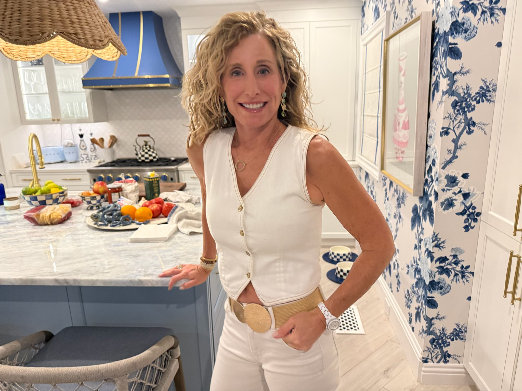 Michelle Pershing three weeks post treatment, smiling in her kitchen at home